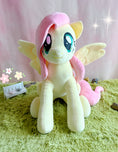 Load image into Gallery viewer, A 20-inch jumbo officially licensed plush of Fluttershy. Pictured here is the My Little Pony - Fluttershy Jumbo Plush.