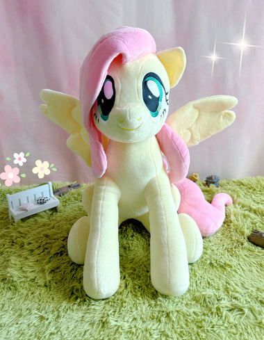 Load image into Gallery viewer, A 20-inch jumbo officially licensed plush of Fluttershy. Pictured here is the My Little Pony - Fluttershy Jumbo Plush.