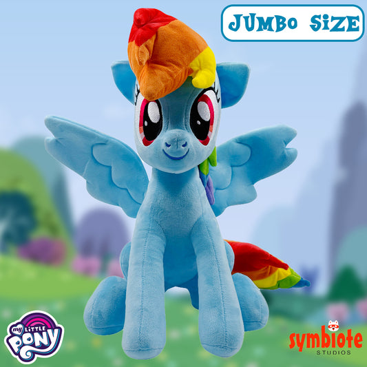 Jumbo size plush toy of a blue pony with rainbow mane and tail against a blurred outdoor background.