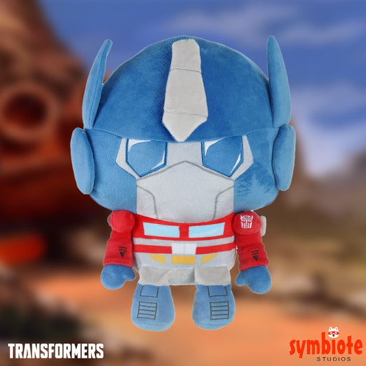 Plush toy of a robot character from Transformers with a blurred background