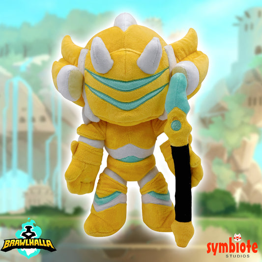 Yellow plush toy with white horns and blue accents against a blurred background