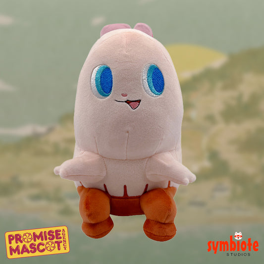 Plush toy with blue eyes and orange feet on a blurred natural background, featuring 'Promise Mascot' and 'Symbiote Studios' logos.