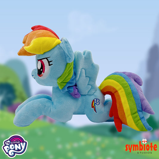 Plush toy of a rainbow-colored pony with 'My Little Pony' branding.