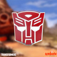 Load image into Gallery viewer, Transformers Autobot Logo Pin, an officially licensed enamel pin of the Autobot emblem, sold by Symbiote Studios.
