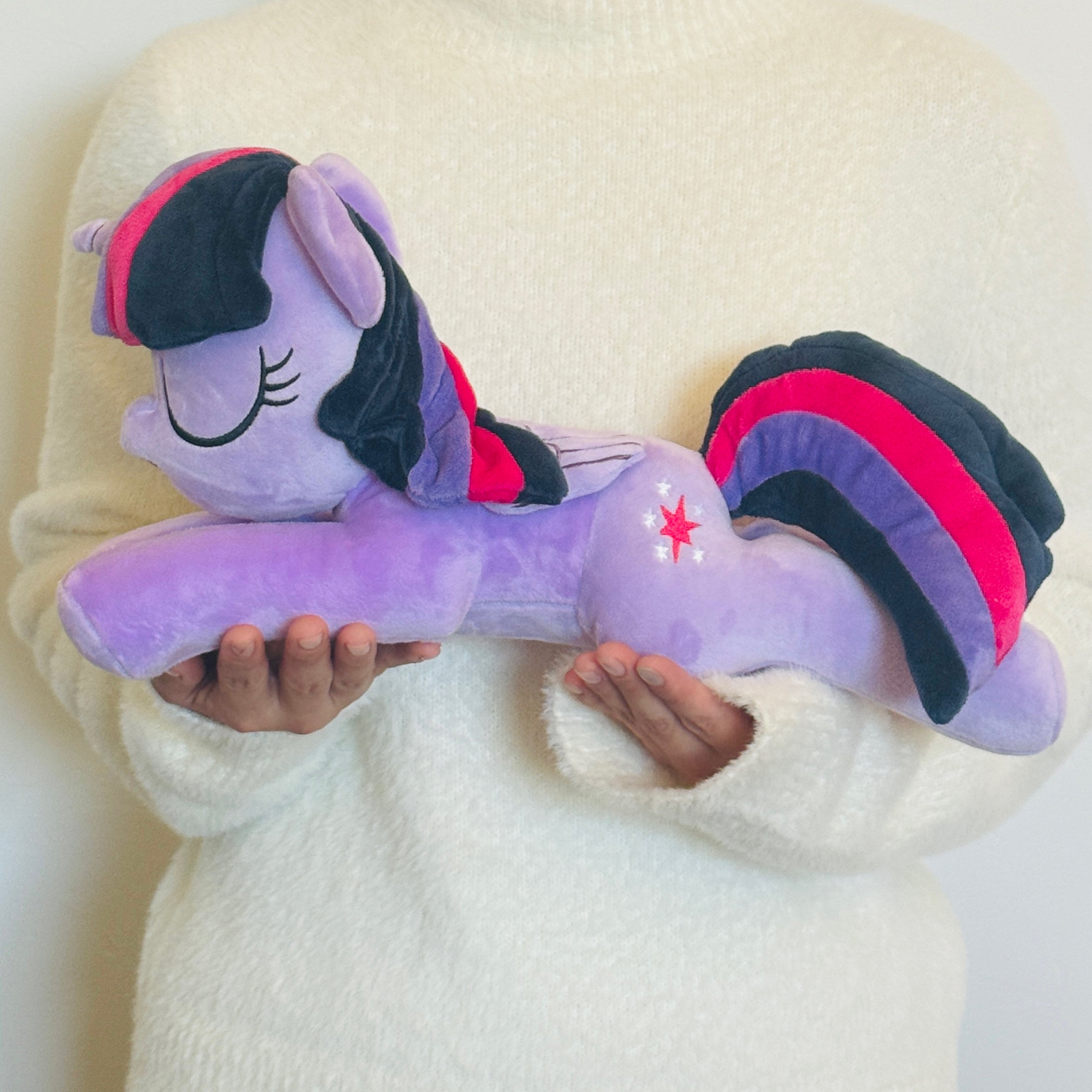 A sleepy-eyed officially licensed dream plush of Twilight Sparkle. Pictured here is the My Little Pony Twilight Sparkle Dream Plush. (IMG_0156.jpg)