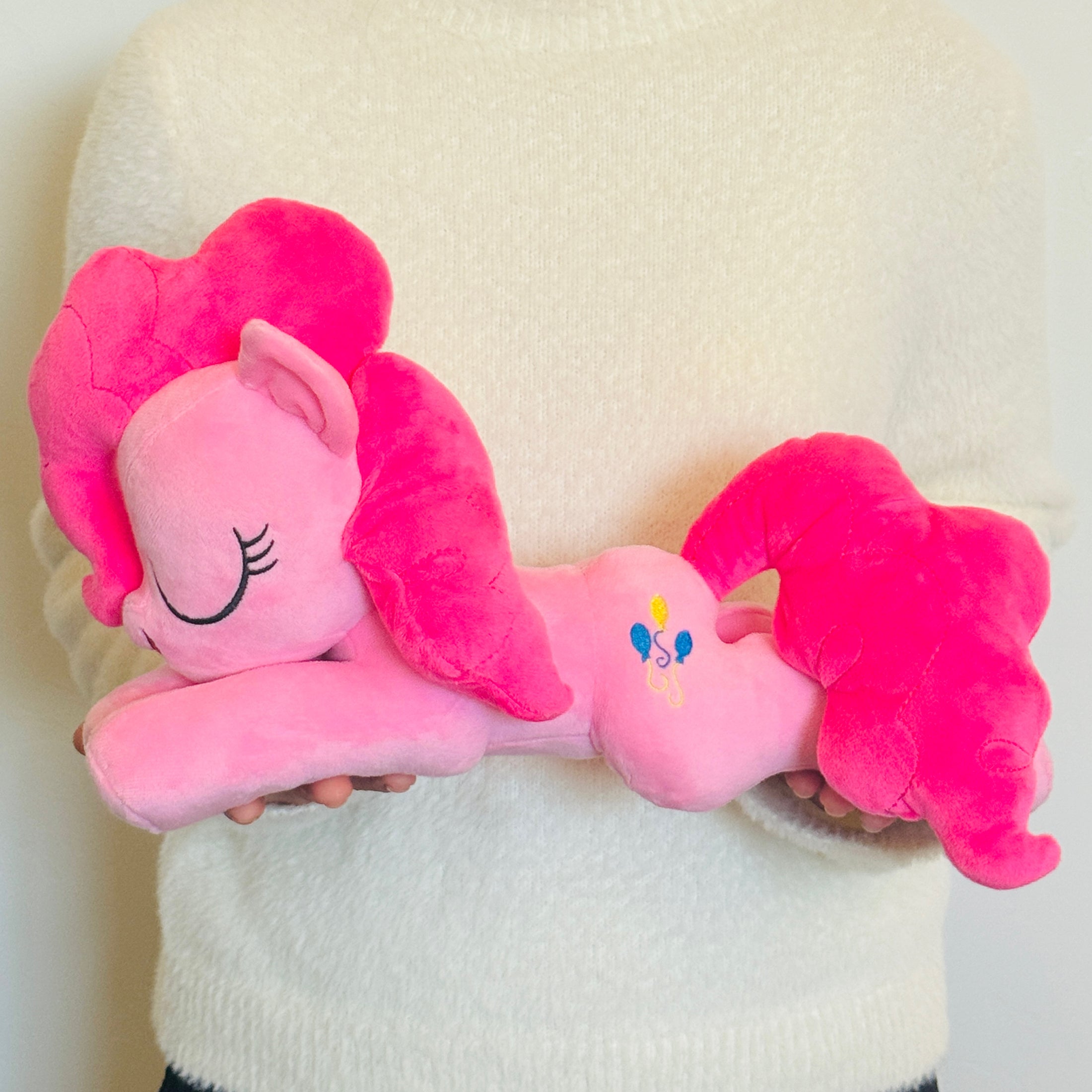 A sleepy-eyed officially licensed dream plush of Pinkie Pie. Pictured here is the My Little Pony Pinkie Pie Dream Plush. (IMG_0163.jpg)
