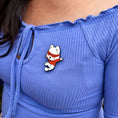 Load image into Gallery viewer, An enamel pin of Catnip Bravo celebrating with arms raised and a big smile. Pictured here is the Catnip Bravo Celebration Pin.
