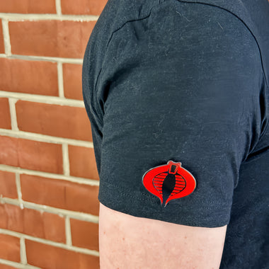 Gallery viewerに画像を読み込む, An enamel pin featuring the G.I. Joe Cobra emblem. Pictured here is the G.I. Joe Cobra Logo Pin.
